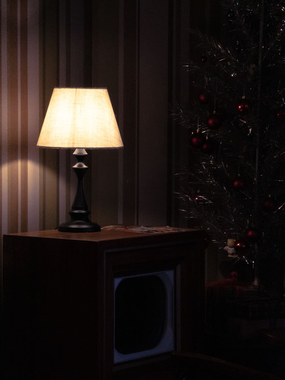 Warm glowing table lamp creating cozy evening ambiance